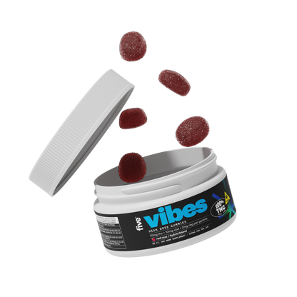 White plastic jar with lid and floating red sugar-coated gummies; jar label reads 'five vibes HIGH DOSE GUMMIES 200mg THC PER JAR'.