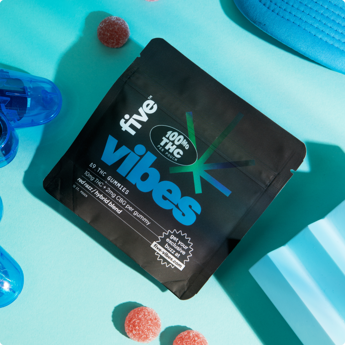 Black resealable pouch labeled 'five vibes' and '100% THC', with two red sugar-coated gummies on a teal background.
