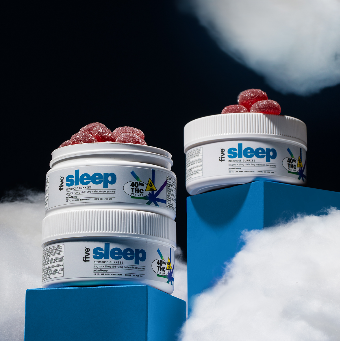 Three jars of five sleep MICRODOSE GUMMIES (mixed berry) with sugar-coated red gummies; label shows 40MG THC PER JAR